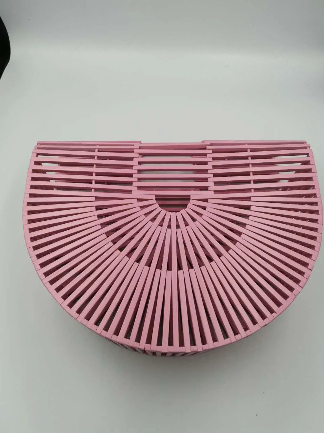 Bamboo clamshell beach backpack in polished natural fibre, available in black pink white yellow four sizes