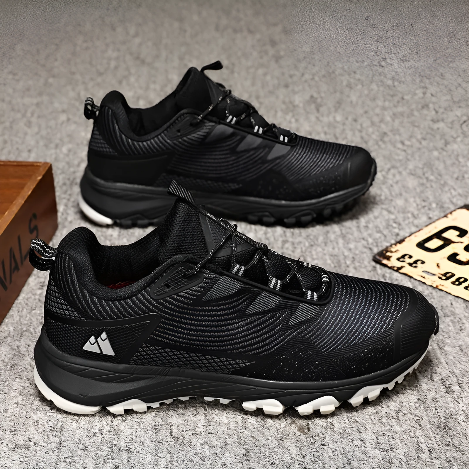 Men's black outdoor hiking shoes with rugged outsole for off-road trails, plus size fit