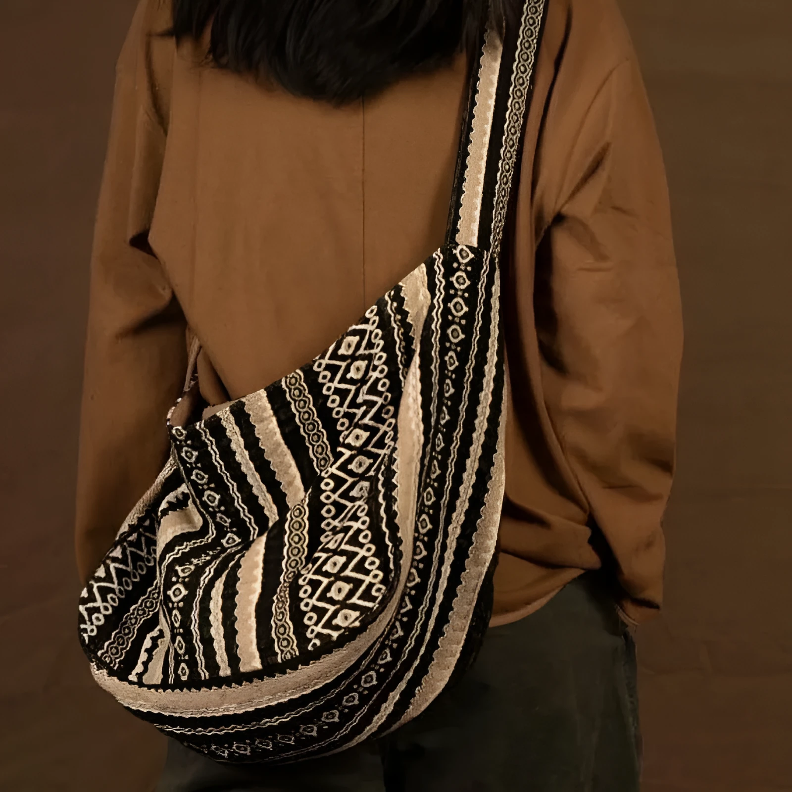 Retro striped corduroy messenger bag with adjustable plaid shoulder strap and zipper closure