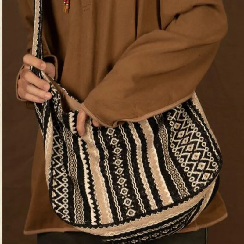 Retro striped corduroy messenger bag with adjustable plaid shoulder strap and zipper closure