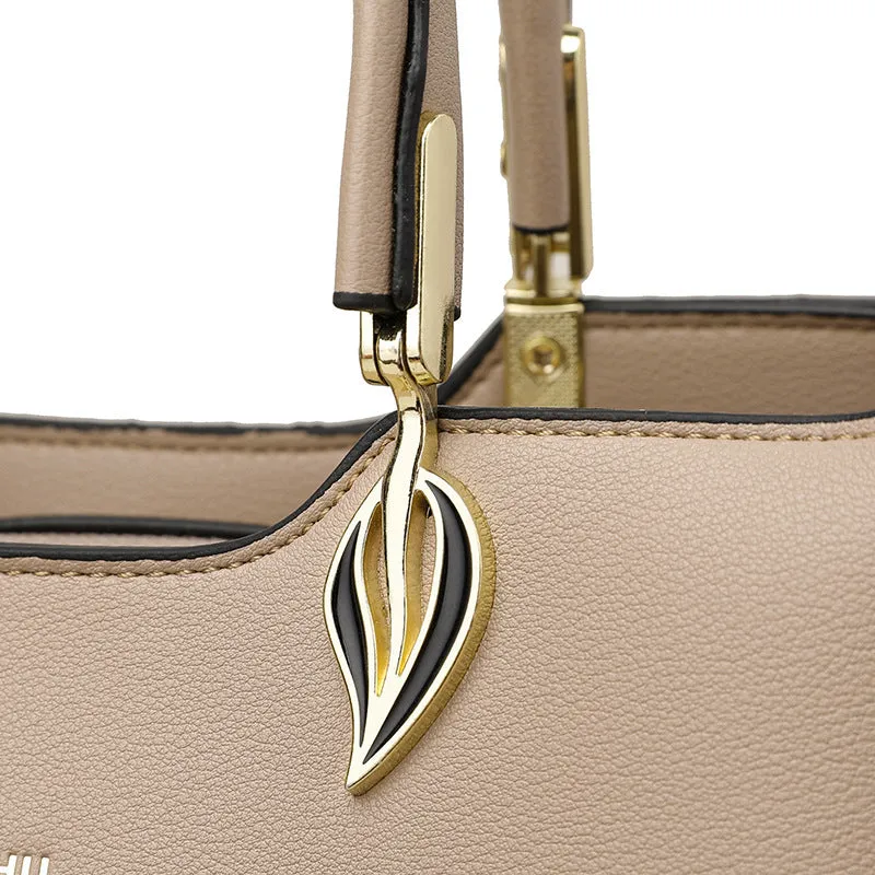 Women's black PU leather messenger bag with shoulder strap and sewing thread detail.