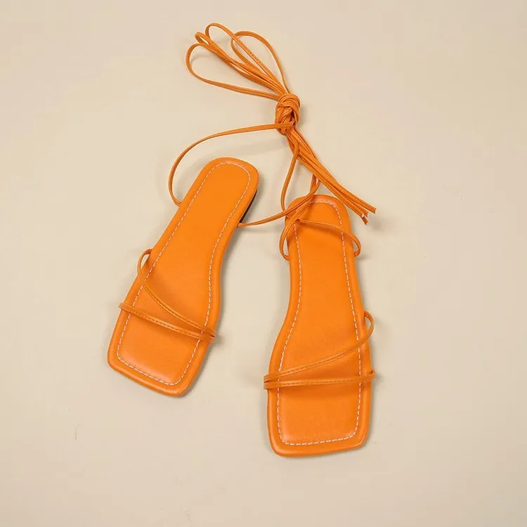 Women's flat sandals with ankle ring bandage cloth design and front lace-up in white colour