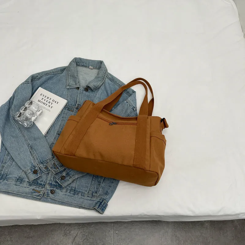 Large solid colour polyester canvas shoulder tote bag for women with outer pocket