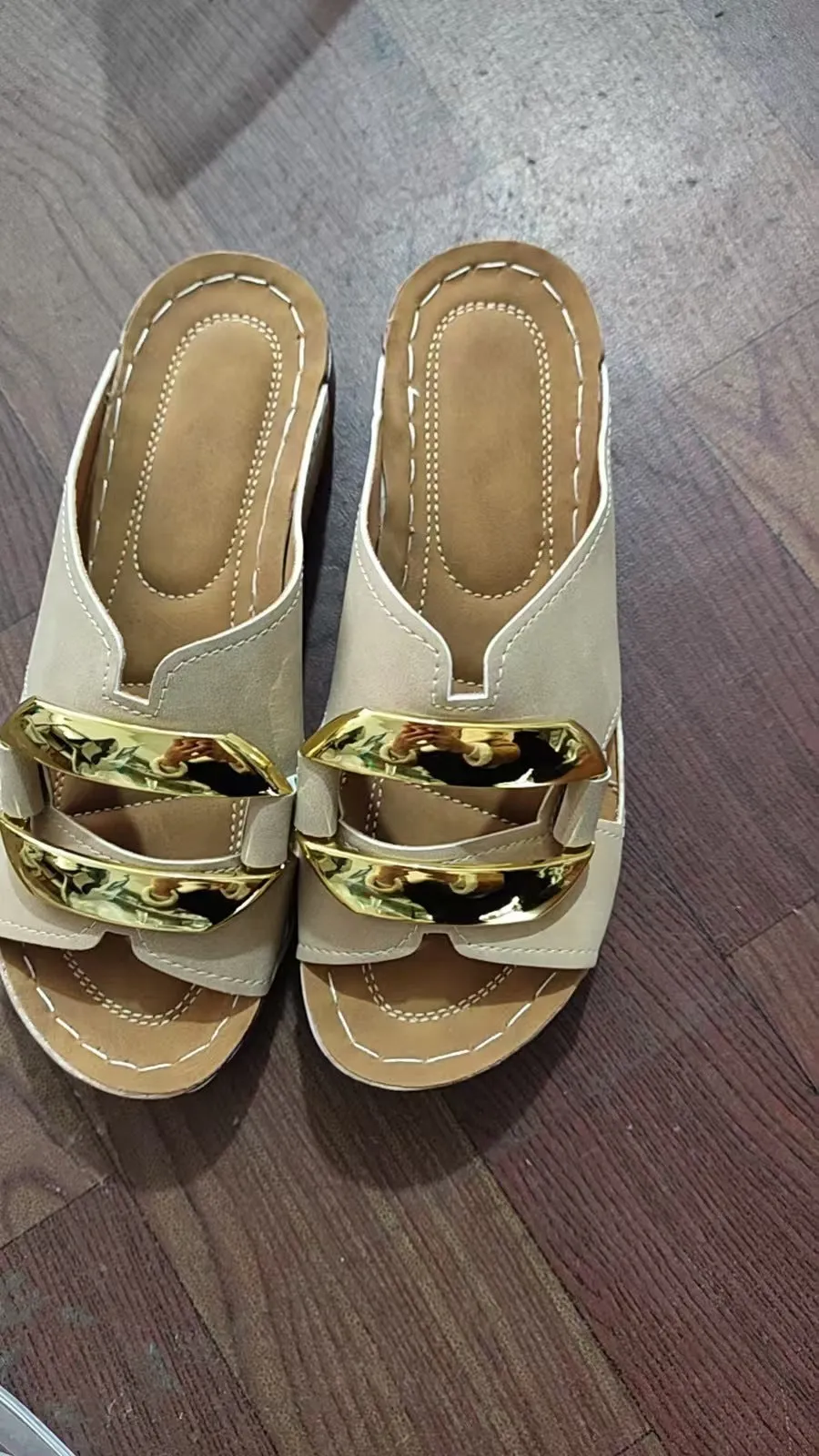 Roman style platform flip-flop sandals in a solid colour on a white background.