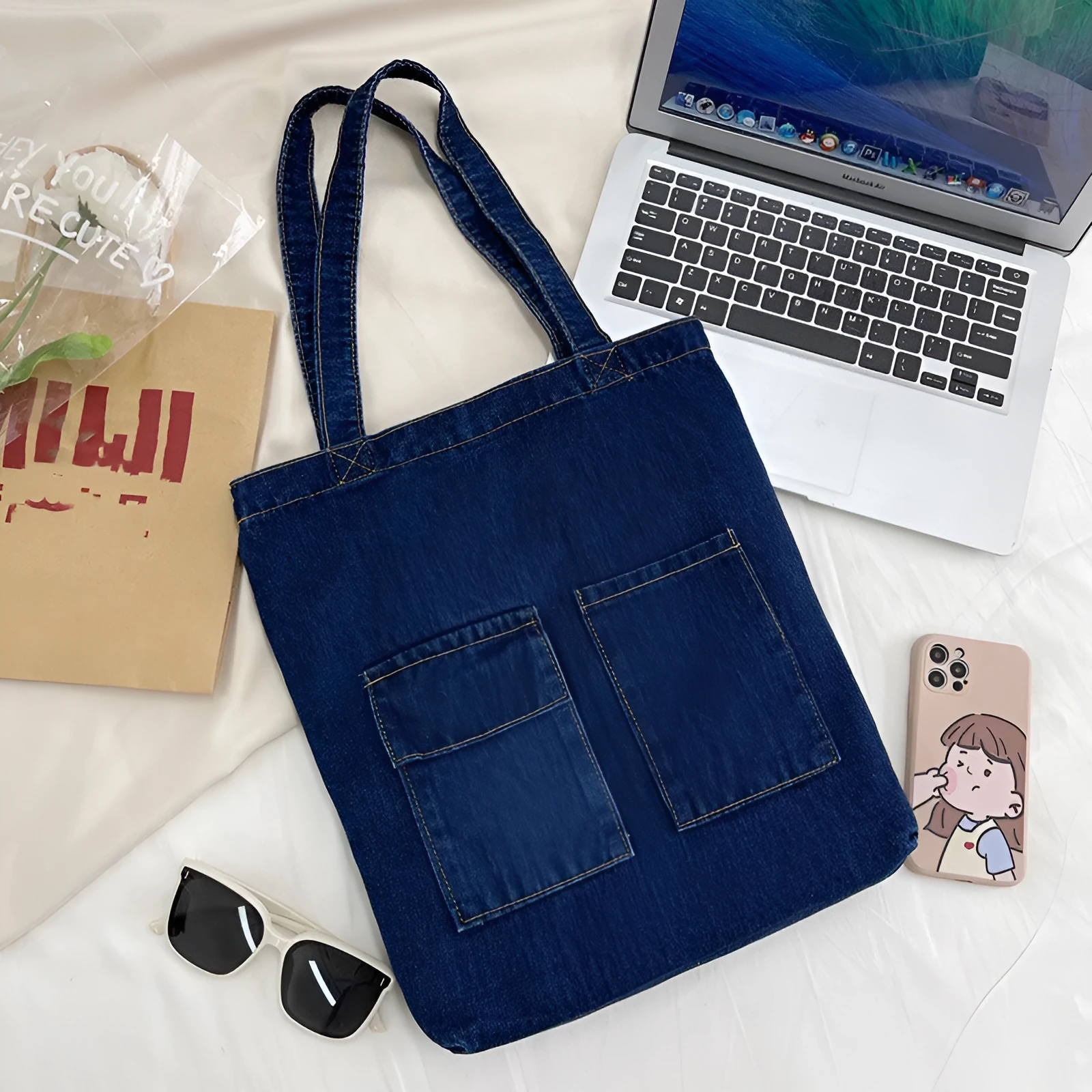 Shoulder bag with soft handle and inner patch pocket available in multiple colours including dark blue