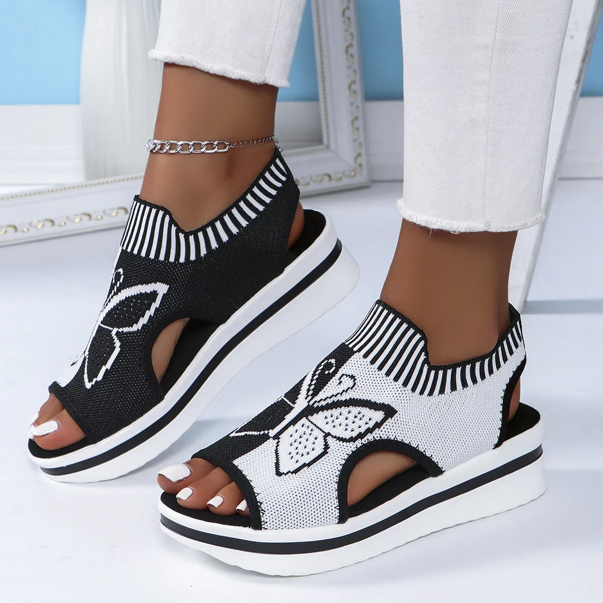 Summer butterfly print sports sandals for women with fabric upper and rubber sole in blue