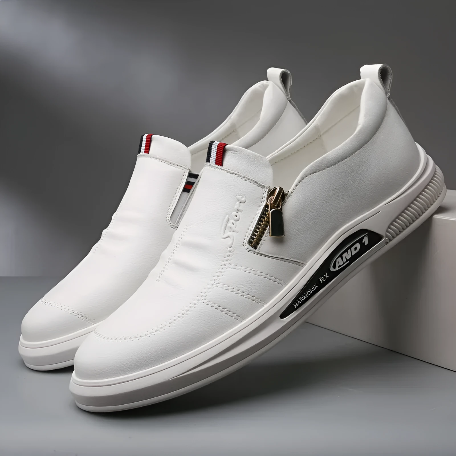 Simple white casual sneakers with breathable inside and flat heel on a plain background