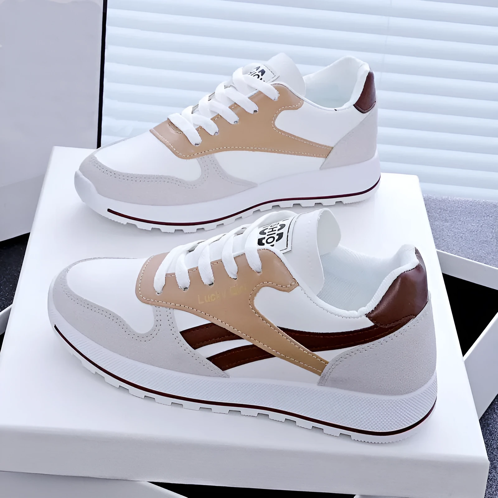 Women's lightweight running sports shoes in white and gray with lace-up front and PU outsole