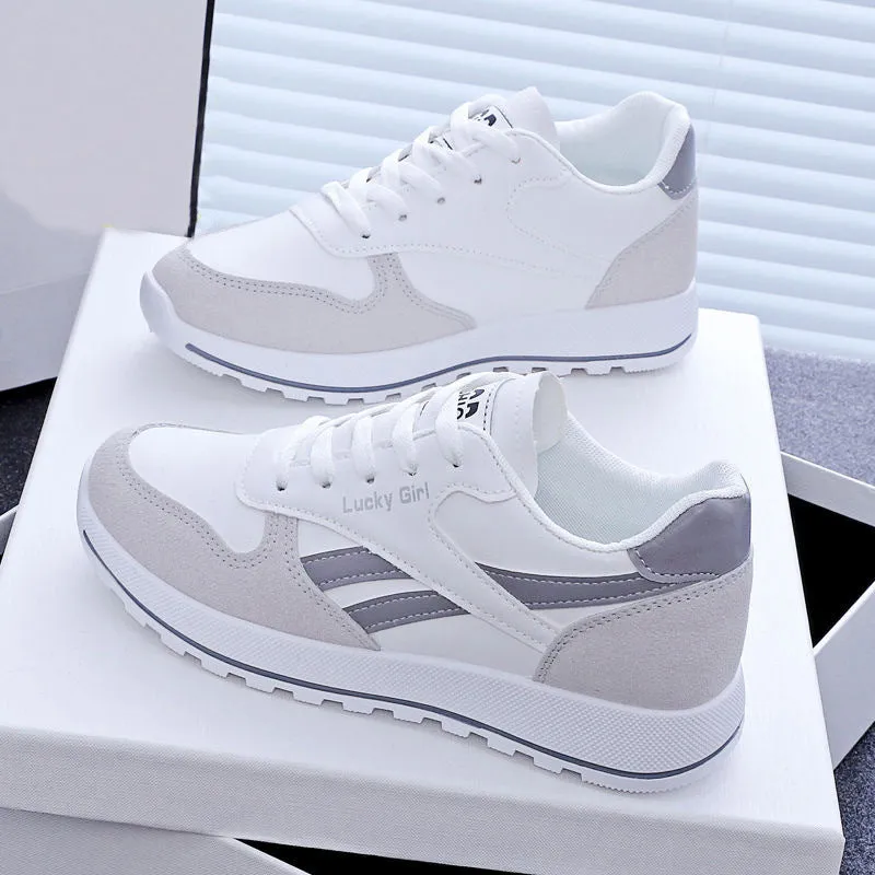 Women's lightweight running sports shoes in white and gray with lace-up front and PU outsole