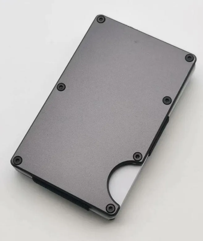 Slim aluminium alloy grey carbon fibre wallet with RFID blocking for cards.