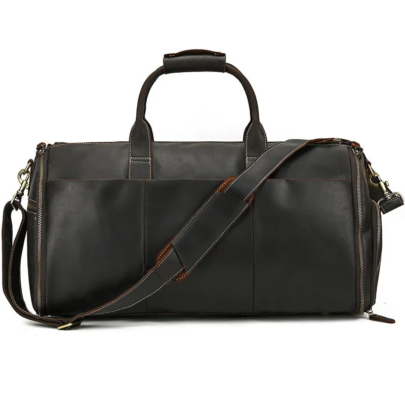 Vintage 22 inch brown leather duffle bag made from top layer cowhide, folding design with zipper closure on plain background