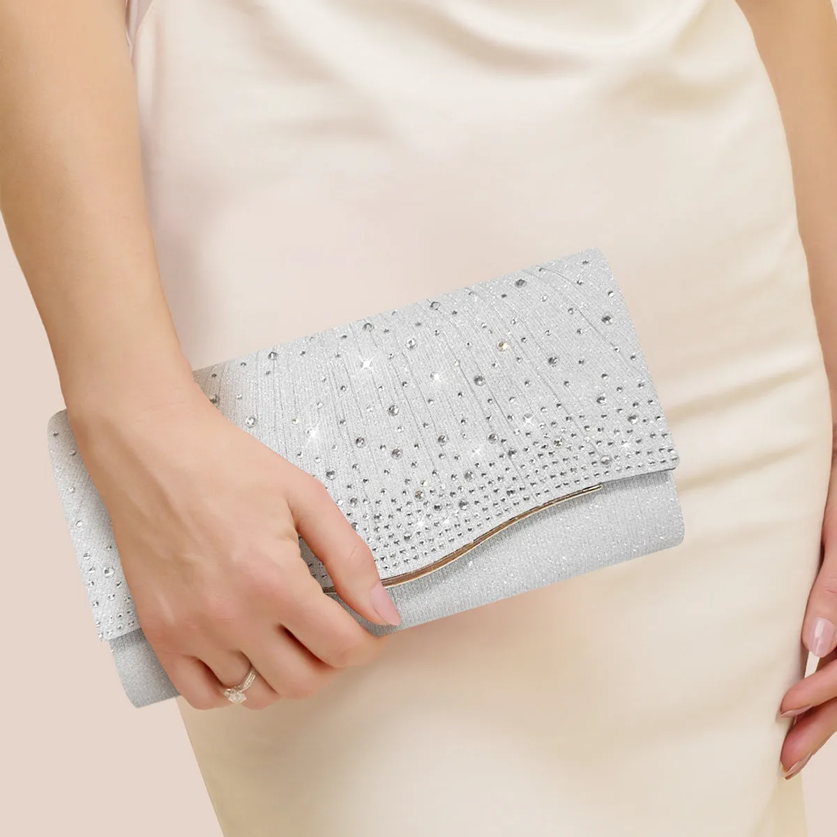 Women's dinner clutch bag in woven fabric with rhinestone dress garment design, available in black, champagne, and silver