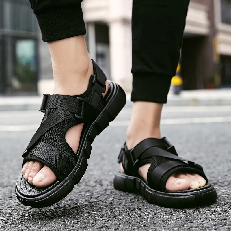 Men's black Velcro open toe beach sandals on a light surface, sizes 39-44