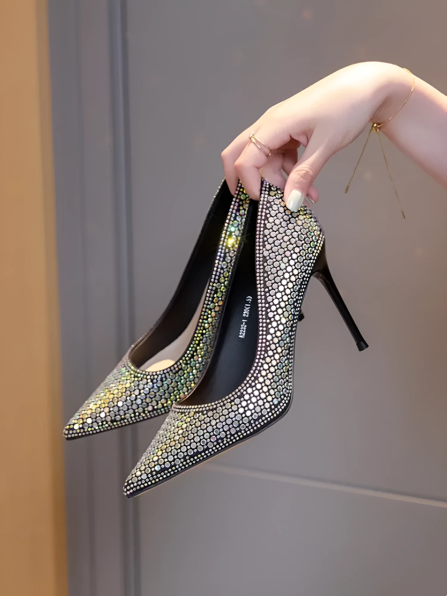 Women's black diamond bird banquet pumps with pointed stiletto heel and PU upper