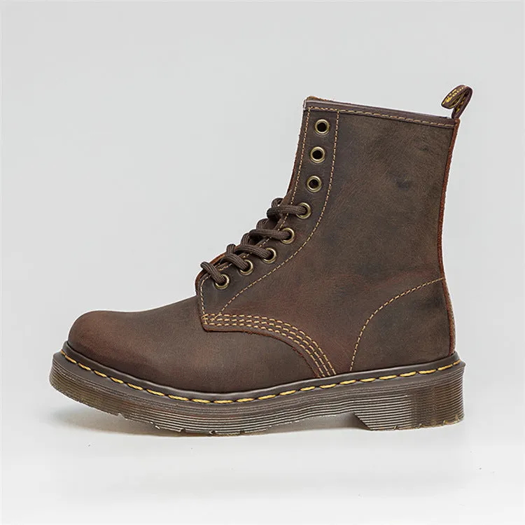 Crazy Horse leather Martin boots with round toe, wedge heel, and front lace-up closure on a white background