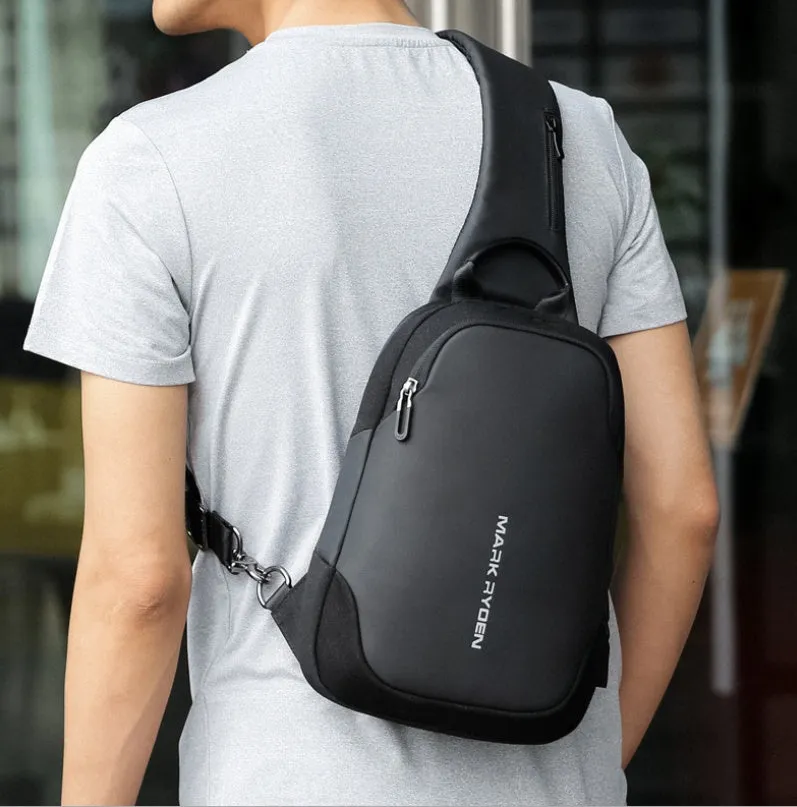 Men's anti-theft USB chest bag in black, made from Oxford cloth with zip closure and square vertical shape