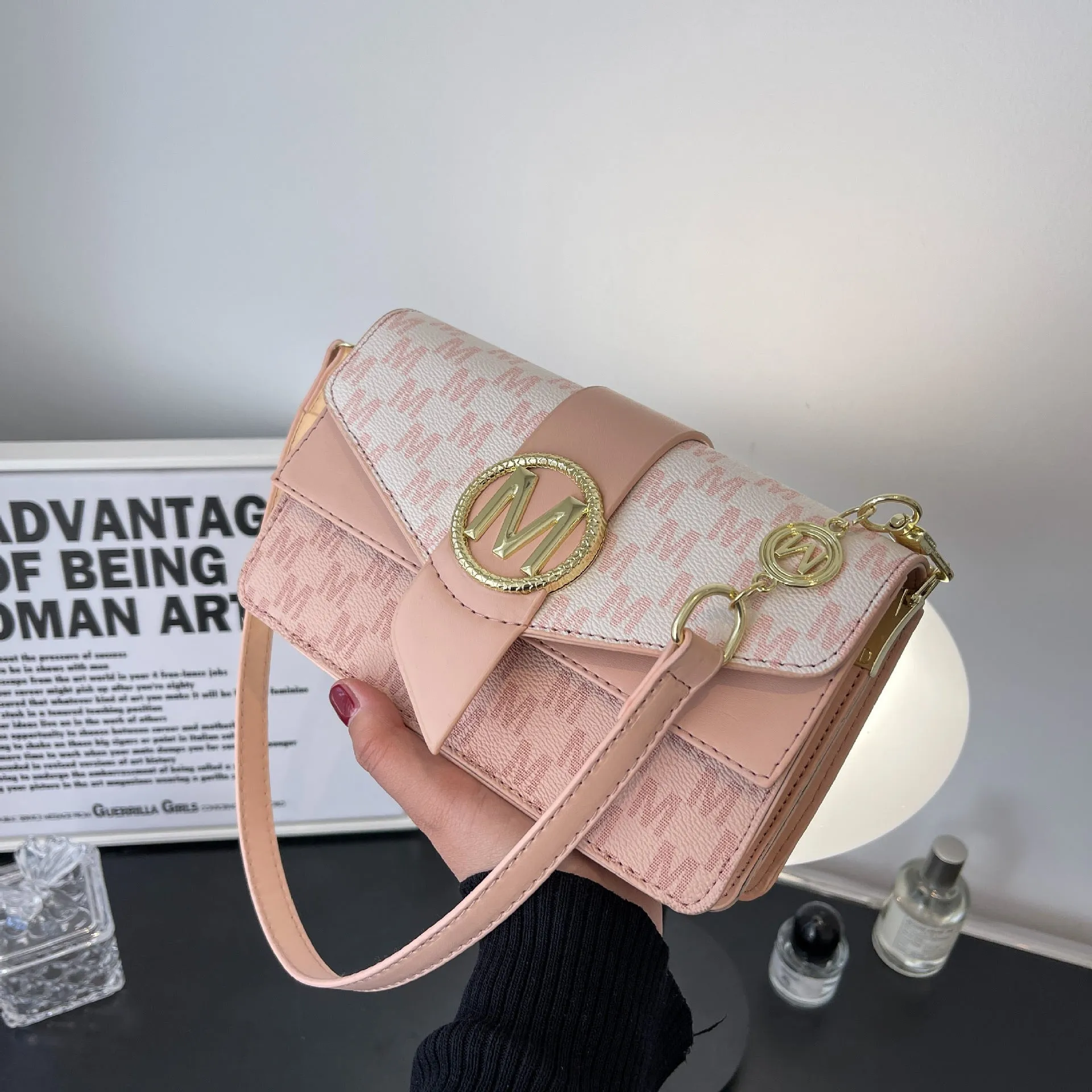 Niche personality printed letter shoulder messenger bag in beige with flap closure and single shoulder strap