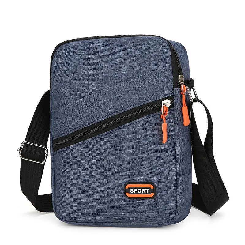 Solid colour Oxford cloth commuter bag with contrast stitching, shown with crossbody strap.