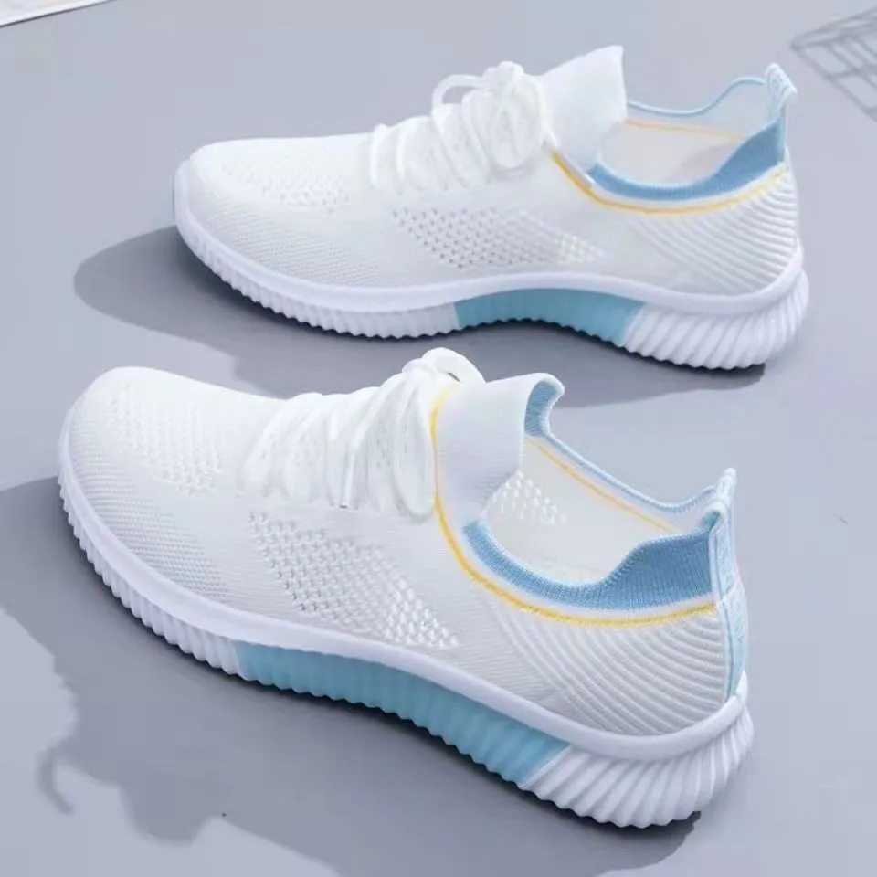 Flyknit breathable white low-top lace-up trainers for women with round toe and PVC sole