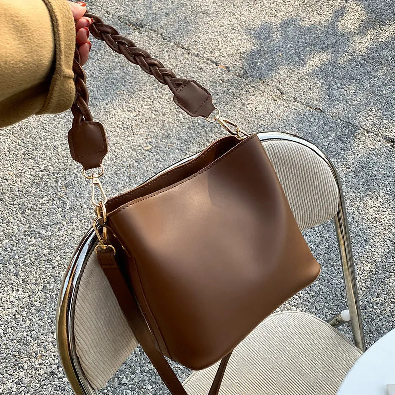 Retro woven PU leather one-shoulder crossbody underarm bucket bag in khaki colour.