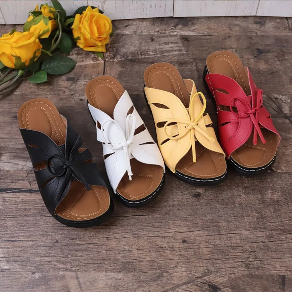 Women's Roman-style lace-up platform wedge sandals in black with PU upper and TPR sole
