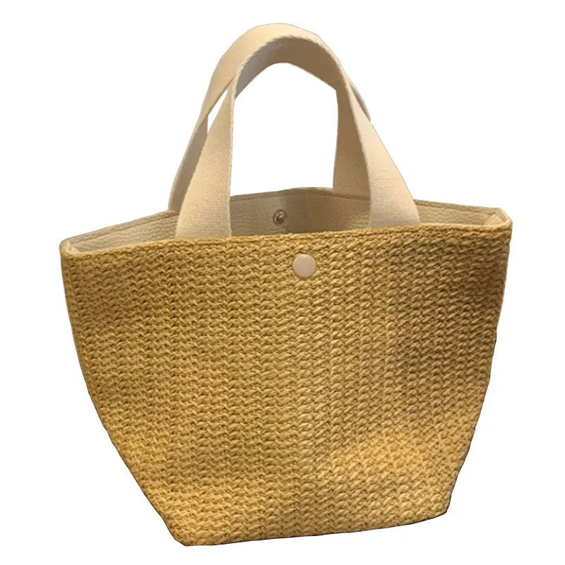 Casual rattan straw shoulder bag in black, bucket shape with shoulder strap