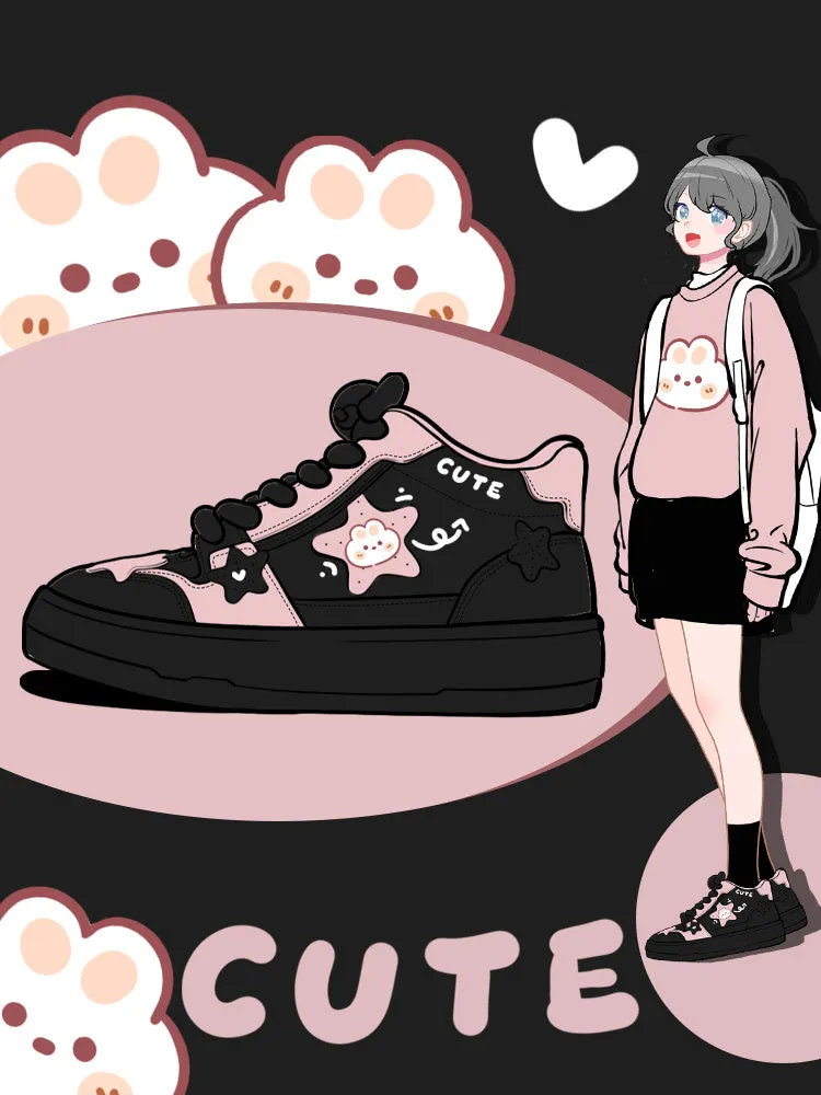 Women's black high top sneakers with cartoon anime pattern, colour blocking, cross straps, and lace-up closure