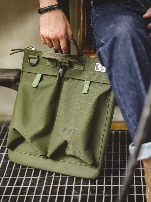 Canvas crossbody messenger bag in retro style showing military green colour with shoulder strap