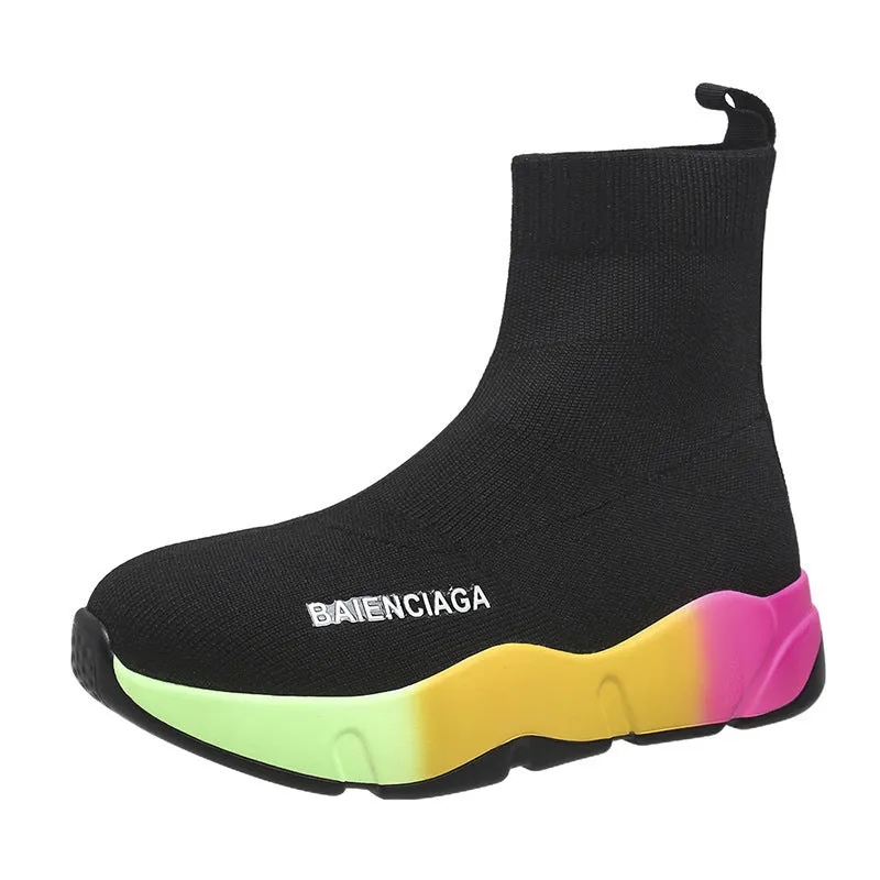 Women's black platform sock boots with cloth upper, rubber sole, round toe, thick heel, and low tube design on a neutral background