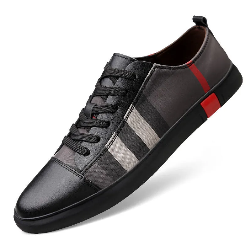 White Korean style breathable leather sneakers for men, round toe with car suture and grid pattern, on a plain background