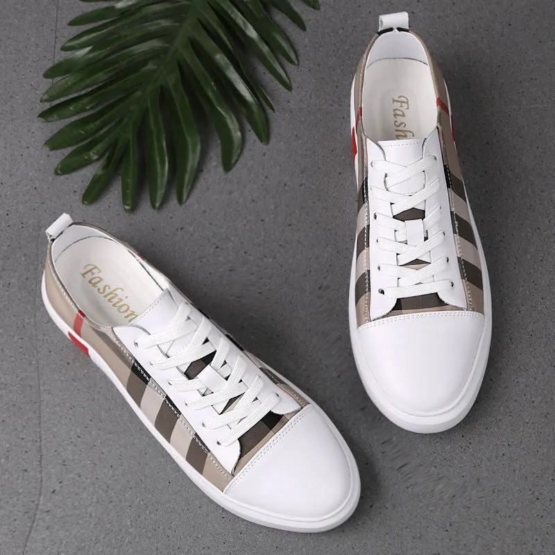 White Korean style breathable leather sneakers for men, round toe with car suture and grid pattern, on a plain background