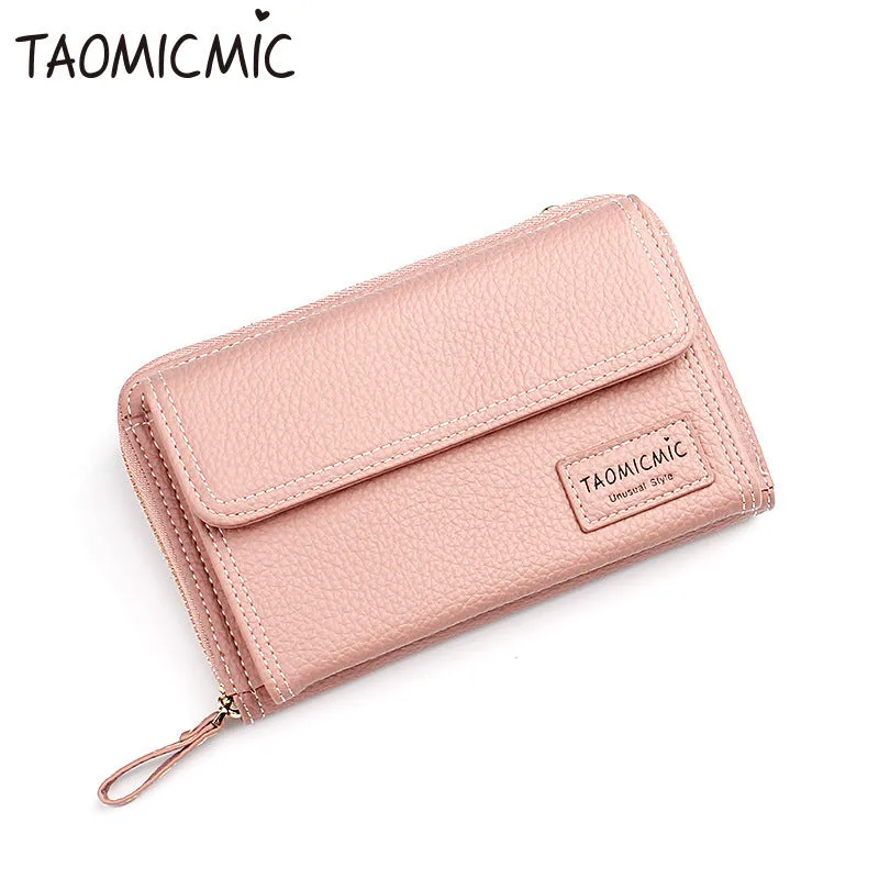 Women's shoulder bag in blackish green with adjustable strap and zipper closure, polyester material, on neutral background