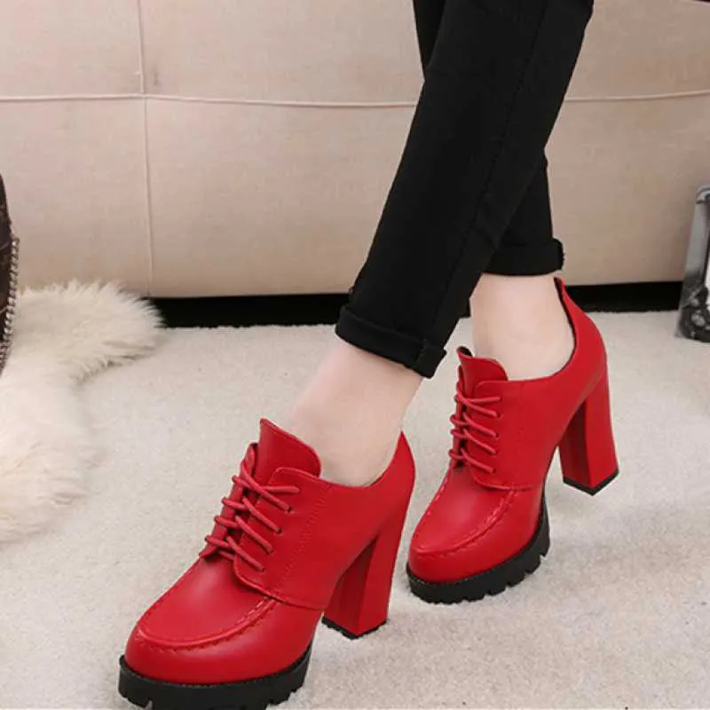 Women's black platform boots with thick heel, PU upper, lace-up front, and round toe