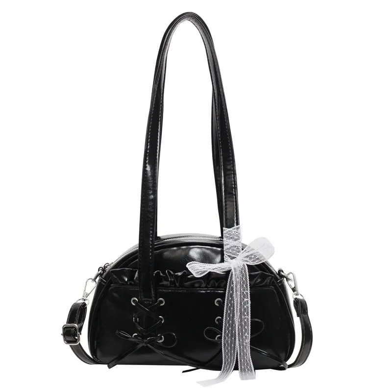 Women's casual PU shoulder handbag with a large bandage bow detail and phone compartment.
