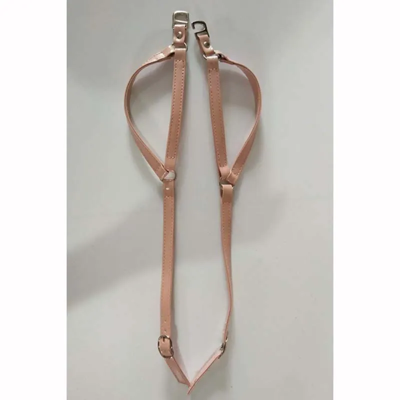 Pair of faux leather triangle shoe straps in black for holding loose high heels securely