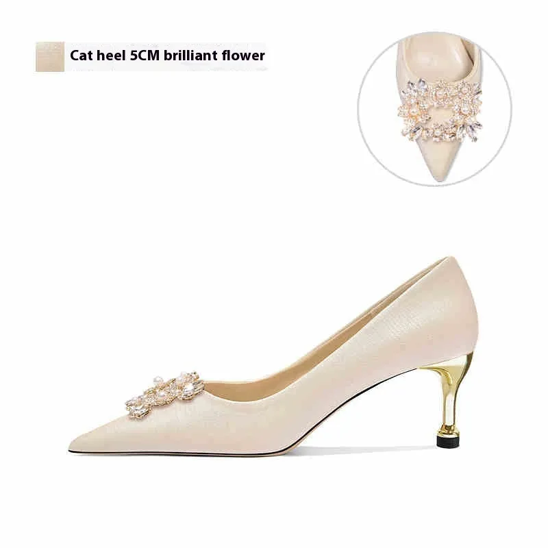 Women's crystal bridal high heels with rhinestone detail, pointed toe, and choice of stiletto or cat heel in 5cm or 8cm heights.