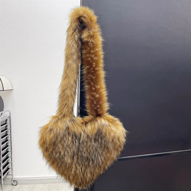Women winter fleece heart shape crossbody bag with plush exterior, tassel detail, and large capacity