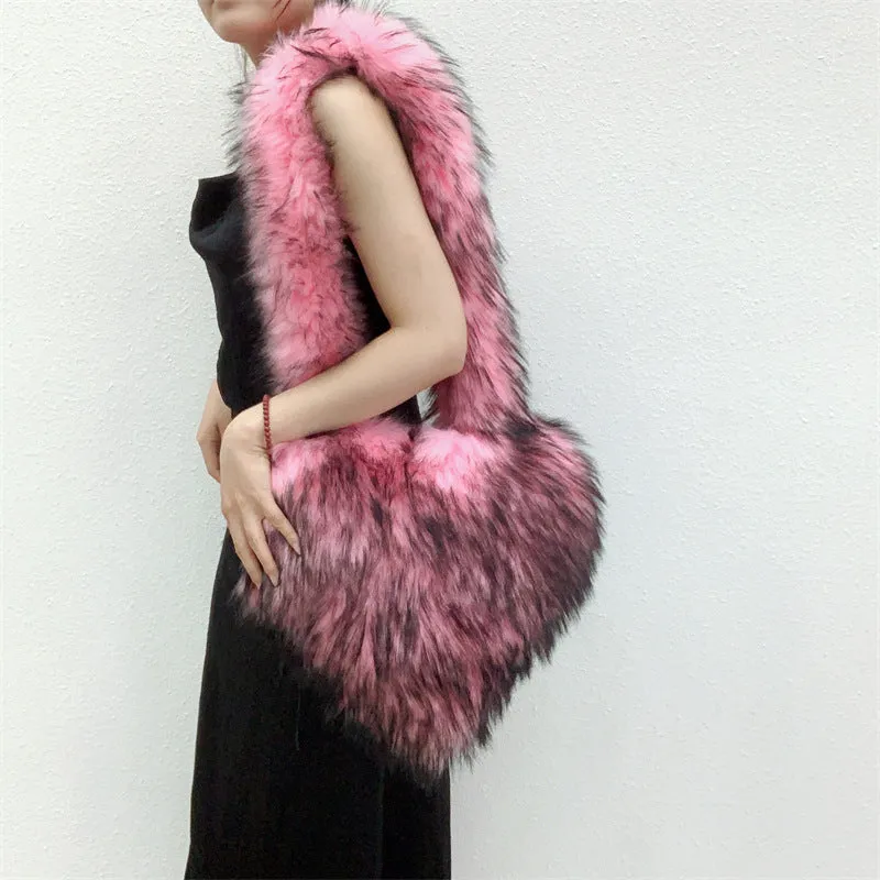 Women winter fleece heart shape crossbody bag with plush exterior, tassel detail, and large capacity