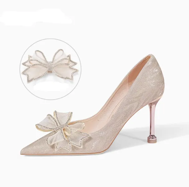 Women's champagne gold sequined pointed stiletto heel pumps for weddings, shown on a plain background.