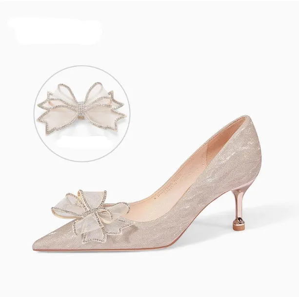 Women's champagne gold sequined pointed stiletto heel pumps for weddings, shown on a plain background.