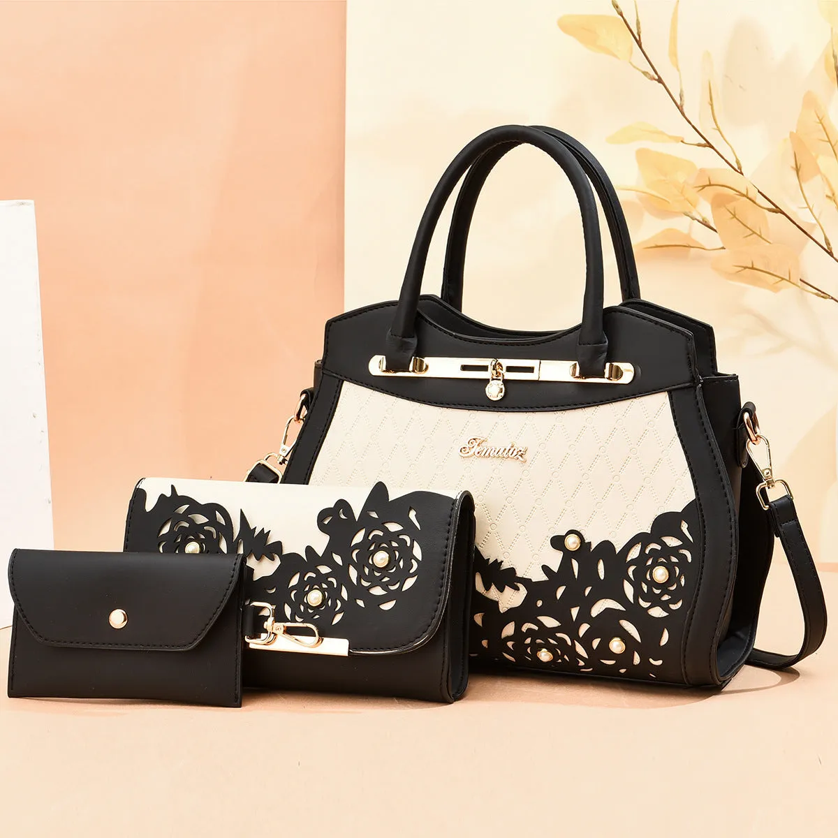 Three-piece PU leather handbag set in black includes large handbag, wallet, and small square bag with zipper closure