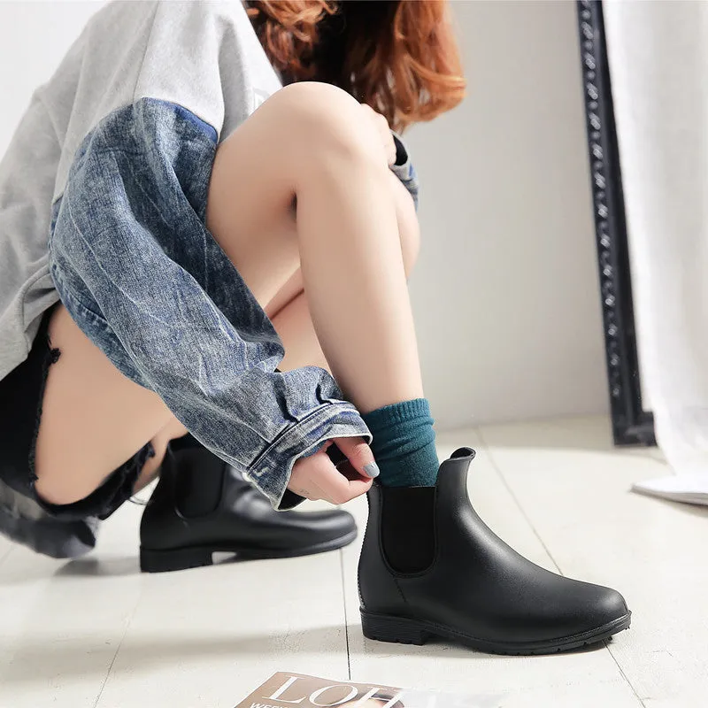 Women's PVC rain boots in black, Martin style with low tube and low heel design
