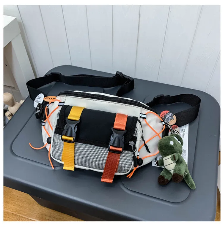 Fashion brand ladies nylon messenger bag with bungee style, black with badge, medium size, plain pattern