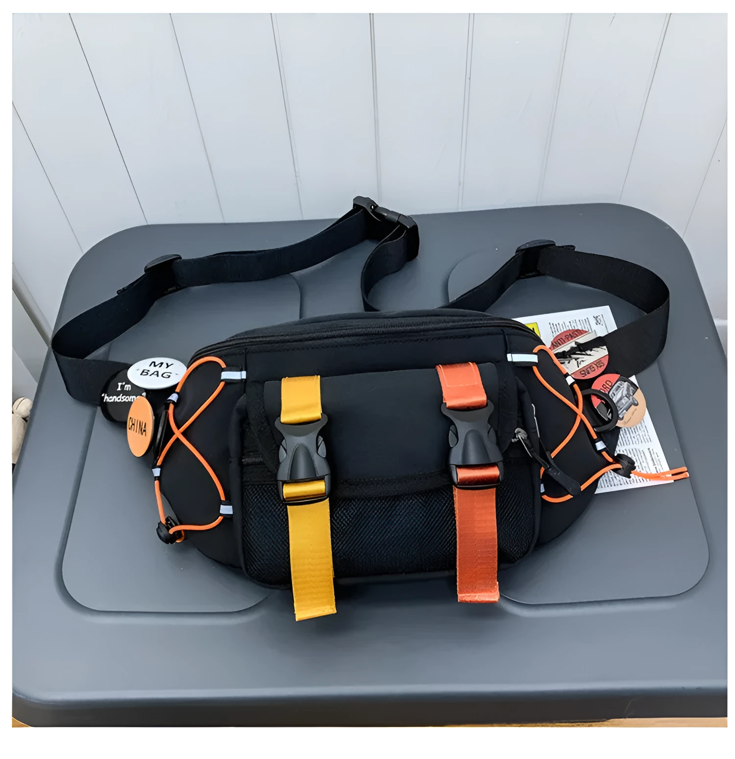 Fashion brand ladies nylon messenger bag with bungee style, black with badge, medium size, plain pattern