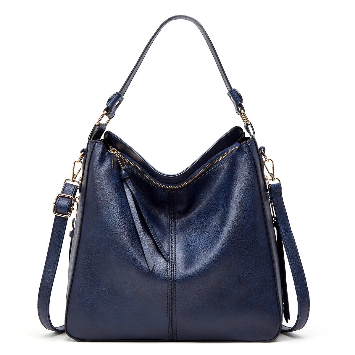 Hobos zipper bucket bag in black with adjustable shoulder strap on a woman's shoulder