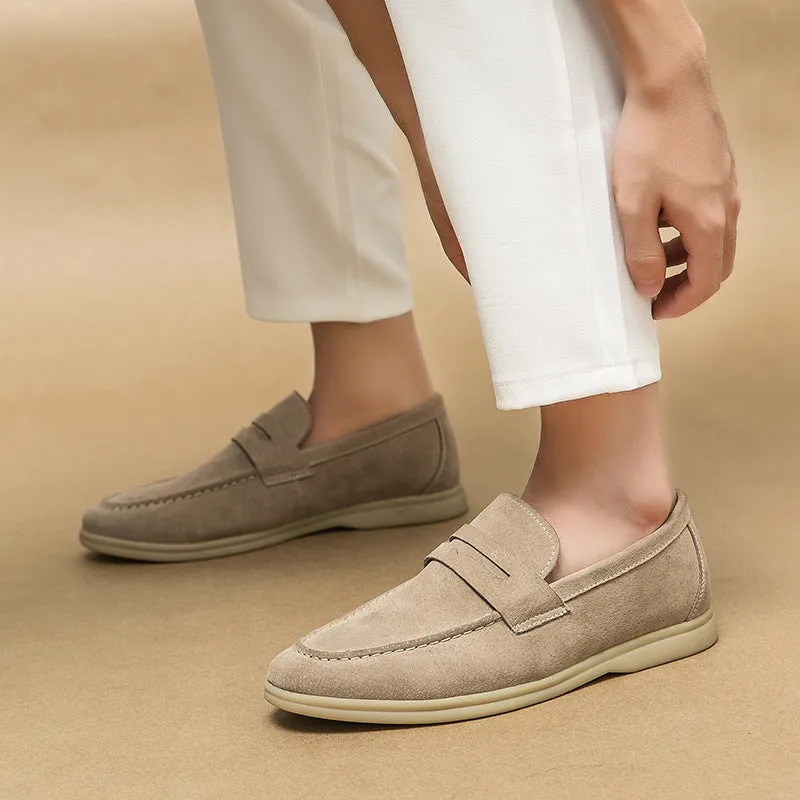 Men's black slip-on leather shoes with oversleeve design and rubber sole.