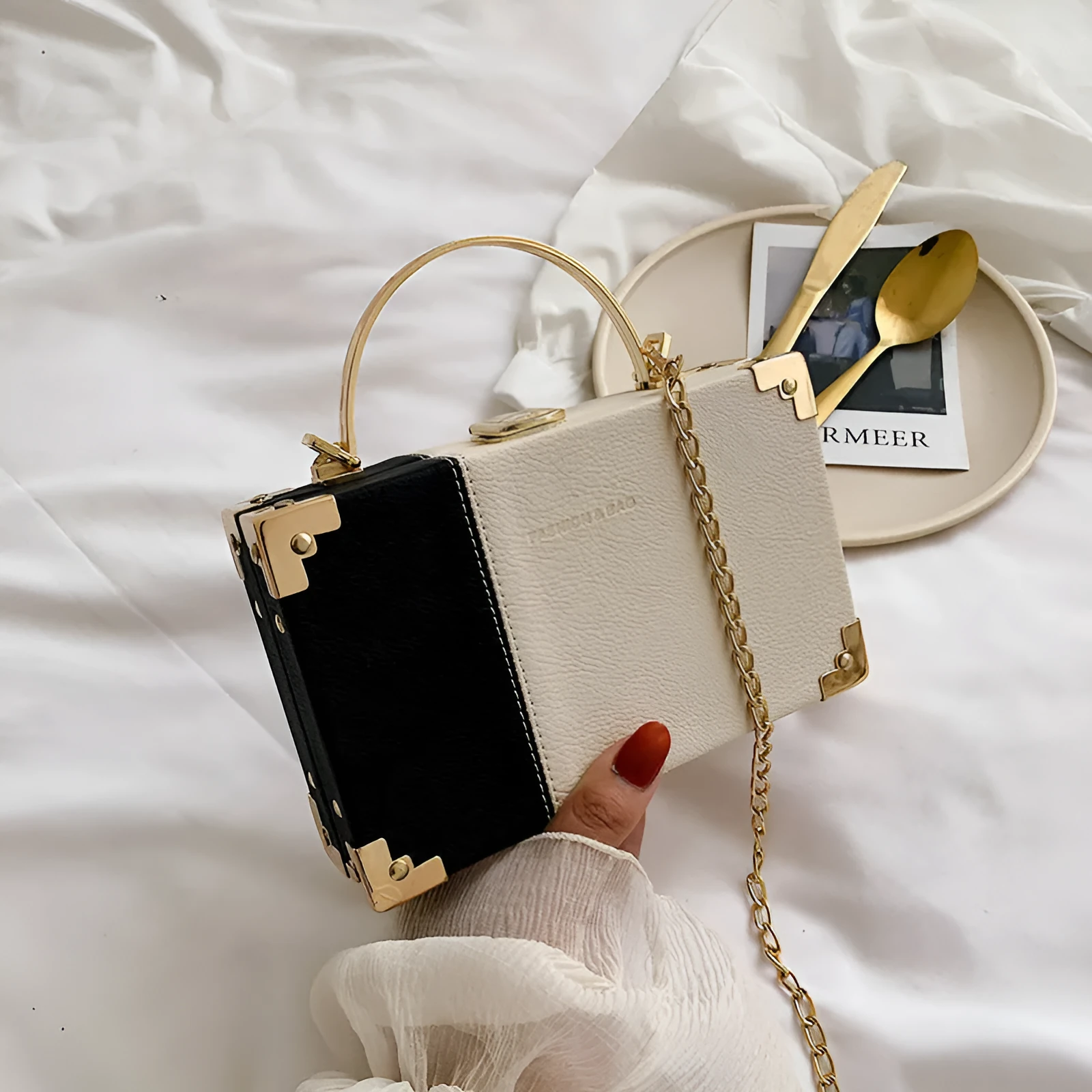 Ladies party clutch bag in orange with box handle and long chain, PU artificial leather, 19x5x12cm