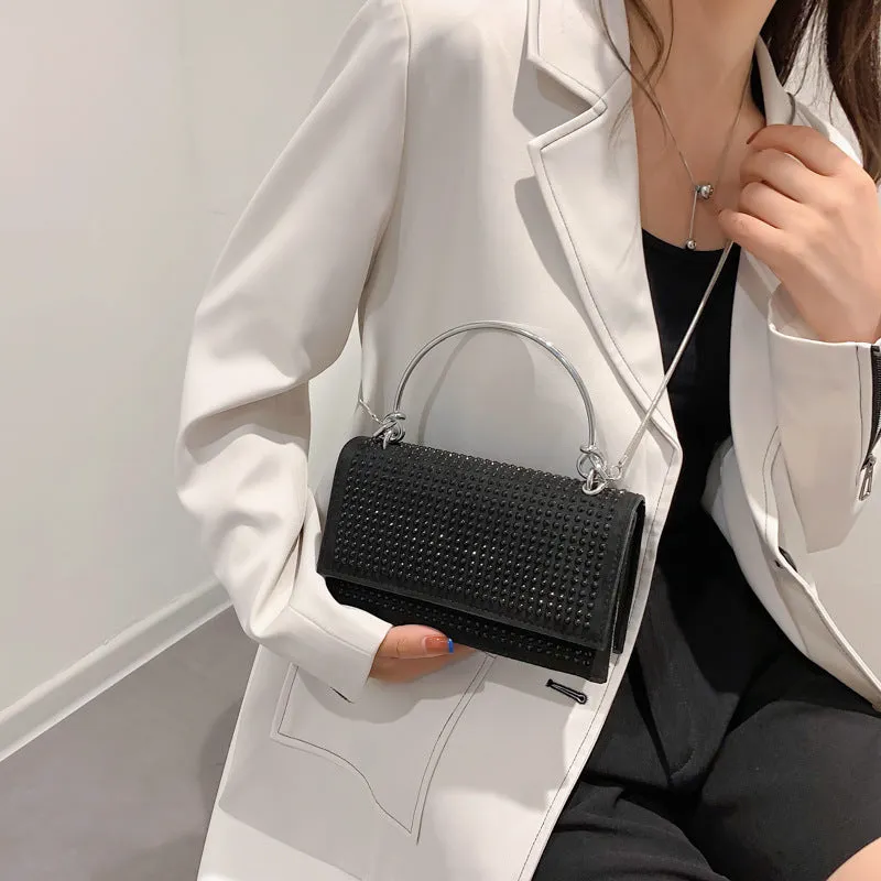 Small square chain crossbody bag for women with rhinestones in silver and black, PU construction with crossbody strap