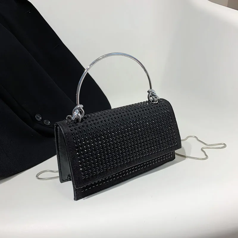 Small square chain crossbody bag for women with rhinestones in silver and black, PU construction with crossbody strap