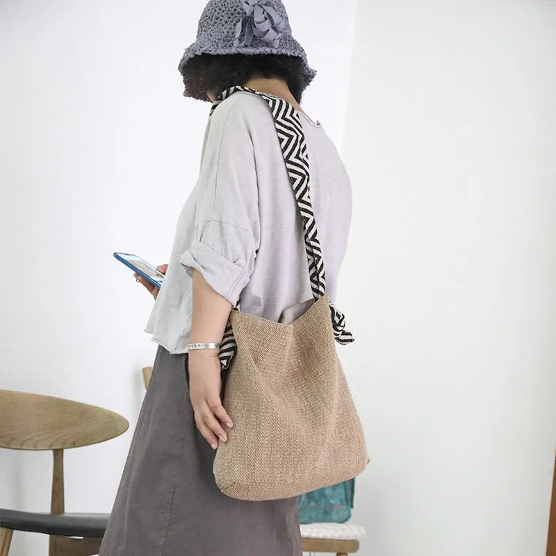Khaki one-shoulder polyester canvas tote bag with cotton lining, magnetic closure, and internal pockets on a plain background